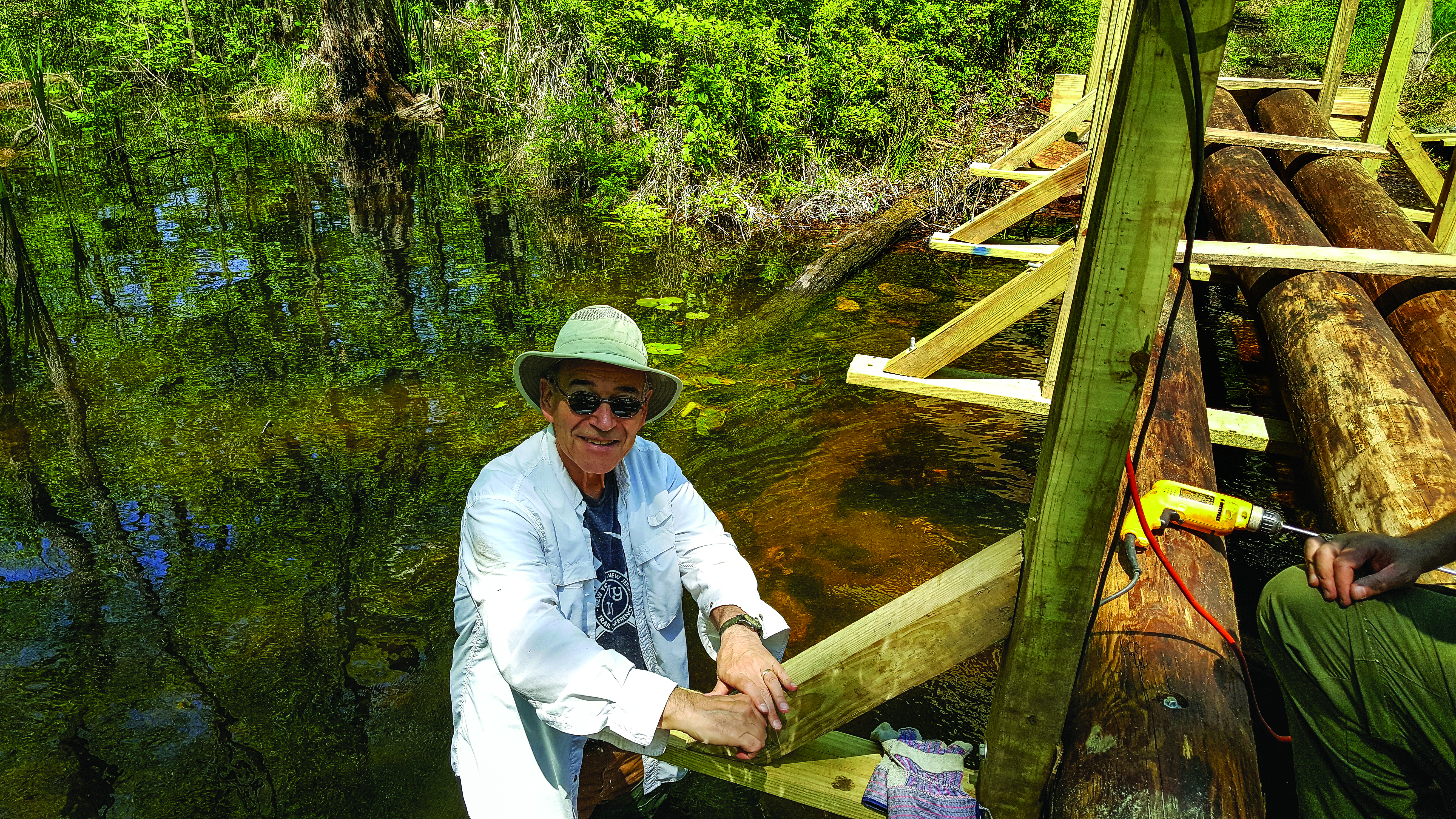Trail Conference member Bob Gurian worked on the Crom Pond bridge. Photo credit: Jane Daniels.