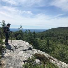 Alex McClain hiking on the Long Path in the Shawangunks. Photo by Alex McClain.